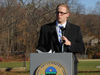 Arlington Town Manager, Adam Chapdelain, addresses the crowd.