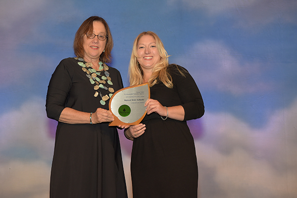 Amy Talbot accepts Excellence in Education and Outreach Award for Regional Water Authority of Sacramento, CA.