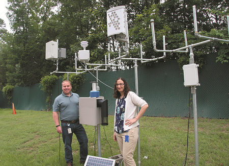 Researchers with fenceline monitoring system 