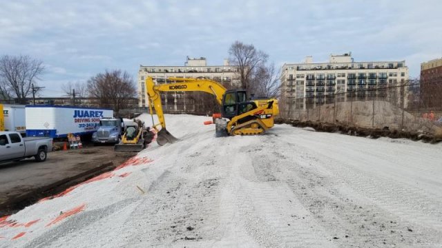 Grading of gravel across the site