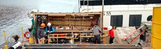 Workers on a boat. Photo: Utah DEQ