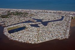 Photograph of a dense coastal community - habitat loss through land use conversion. Photo credit: Andy Serrell