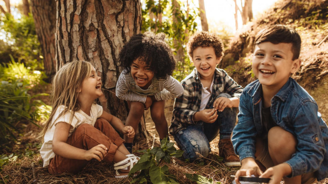 Children playing in the woods