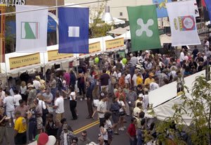 People walking about at a street fair