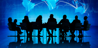 Webinar image - people talking at a table