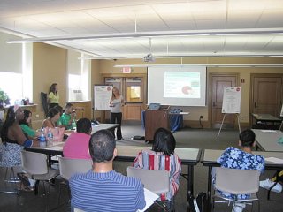 The Green Team looks on as UEP team member Jen Padula explains Greenhouse gases.