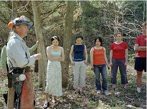 People standing in the woods