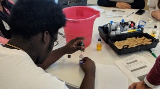 Kids with SWAMP program analyzing samples