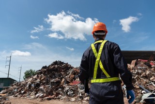 Recycling industry a worker who recycling thing on recycle center