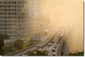 Cloud of smog over a major highway in a city