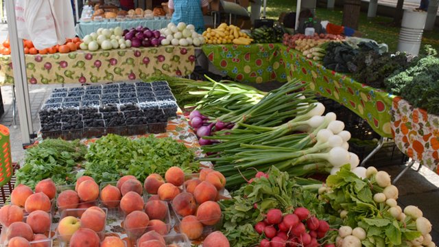 Display of fruits and vegetables in grocery store