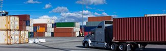 Truck in Shipping Terminal with a link to the Best Clean Air Practices page.