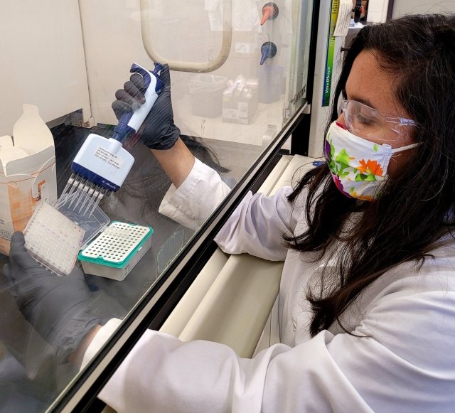 EPA researcher Maitreyi Nagarkar sequences wastewater samples for variants of the SARS-CoV-2 virus in the lab.