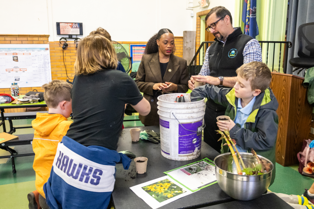 Students are seen working on a project.