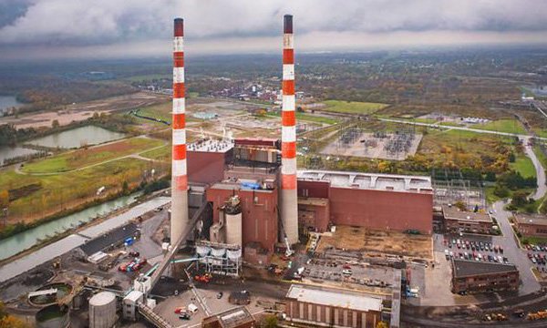 Large industrial plant with smoke stacks