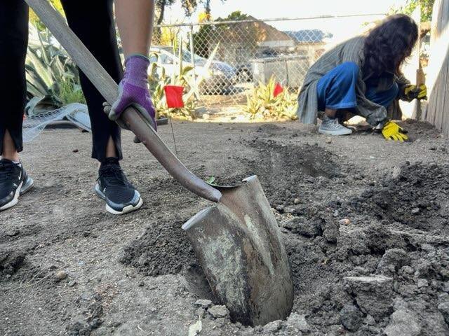 OCEJ staff at work preparing bioremediation sites for OCEJ’s soil bioremediation project.