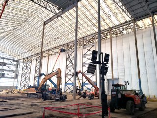 Interior of Segment 3 building with construction equipment and scaffolding visible