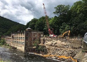 Cleanup in progress, along edge of river (photo credit Franklin Regional Council of Governments)