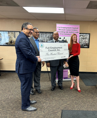 Group photo with $5K ceremonial check to Full Employment Council of KCMO