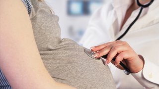 Pregnant woman at doctor's office.