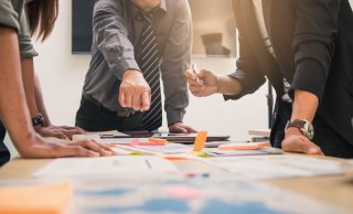 Group exercise around conference table