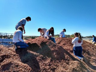 Students restoring degraded soils with locally produced compost in Grant County, New Mexico.