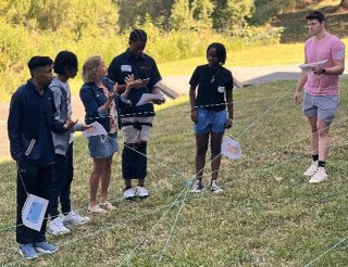 Kelly Witter teaches EPA’s “Connecting Ecosystems and Human Health” activity to students on EPA-RTP’s campus. 